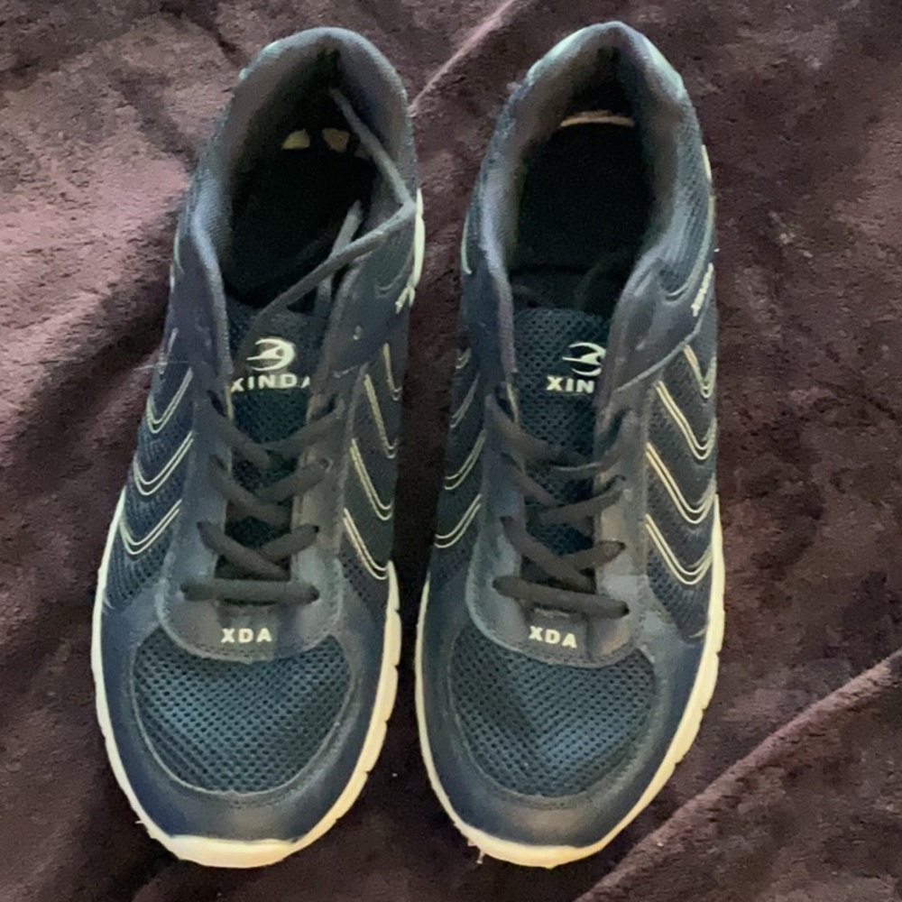 Blue Athletic Shoes with Chevron Stripes and White Soles